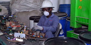 A technician at the Waste Electrical and Electronic Equipment Centre (WEEE Centre) in Utawala, Nairobi on October 2020