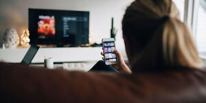 A file image of a person watching TV