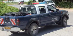 A police landcruiser at a past crime scene