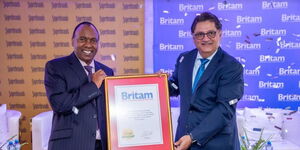 Britam Group CEO and GMD – Tom Gitogo receives the Superbrand seal of approval from Superbrands East Africa Program Director – Jawad Jaffer, after Britam Group was recognized as one of the top 50 performing brands in East Africa.