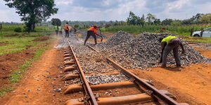 Railway workers renovating the Kenya - Uganda Railway line at Yala station on July 18, 2021.