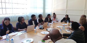 Youth Fund officials holding a meeting with Catherine Kunyanga, the Associate Dean at the Faculty of Agriculture and student representatives from the Nairobi University Agriculture Students Association on May 13, 2024