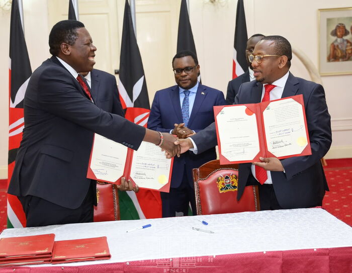 Nairobi Governor Mike Mbuvi Sonko and Devolution CS Eugene Wamalwa shake hands after the signing of the agreement in which functions of the Nairobi County Government were handed to the National Government on Tuesday, February 25 at State House.