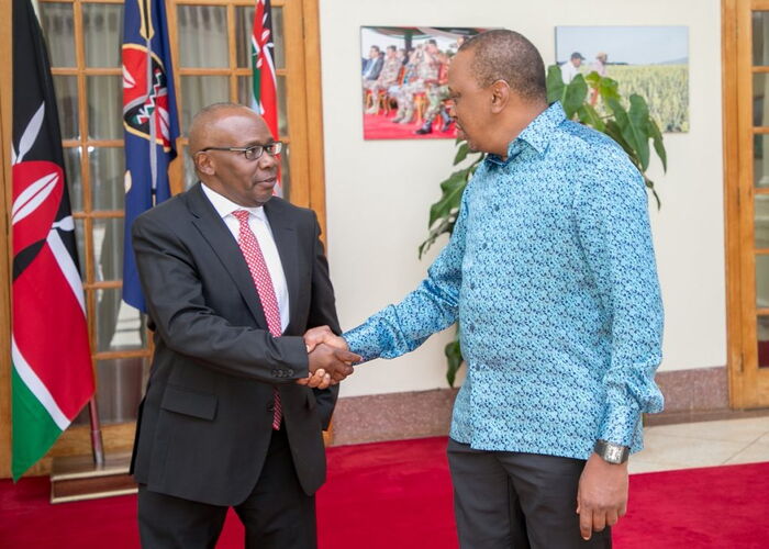 President Uhuru Kenyatta with former Attorney General Githu Muigai after he handed in his resignation letter to the at State House, Nairobi in 2018