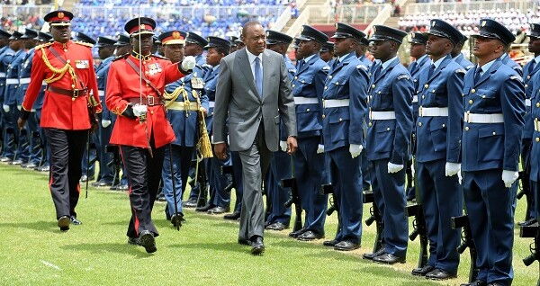 Uhuru Kenyatta inspects a guard of honour at Mama Ngina Waterfront in Mombasa on October 20, 2019