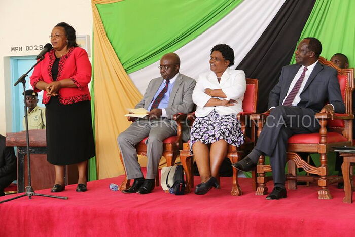 Former Kakamega Investment Agency CEO Ebby Kavai addresses a past county forum with Kakamega Governor Wycliffe Oparanya in attendance on January 4, 2017