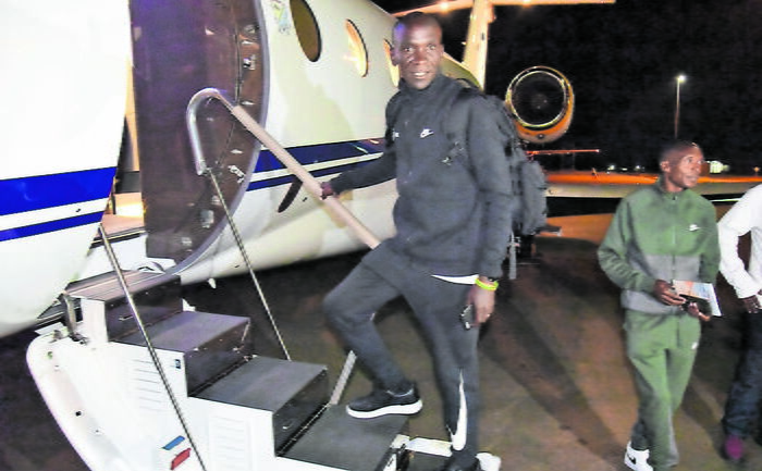 Eliud Kipchoge boarding the chartered plane at Eldoret International Airport