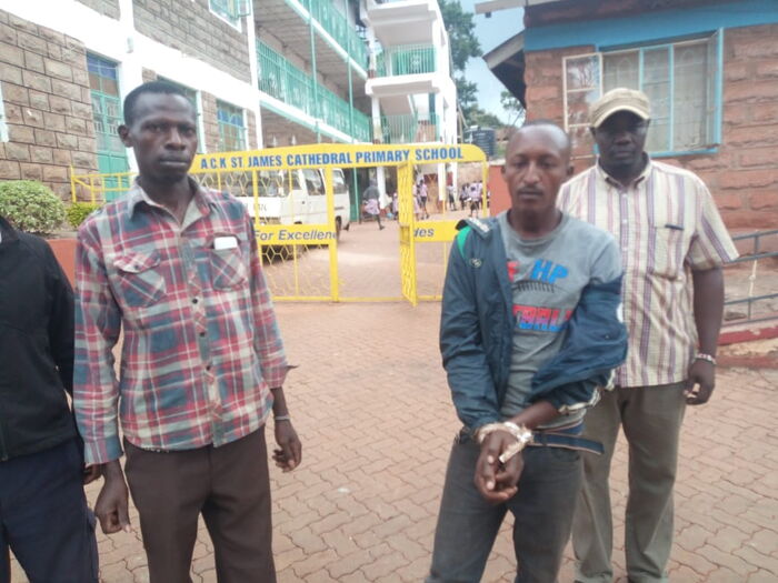 Peter Muiya after being apprehended by Murang'a County residents on Thursday, Friday 13