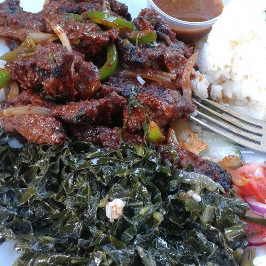 Photo of 'nyama choma' and 'sukuma wiki' served at Safari DC Restaurant in Washington DC.