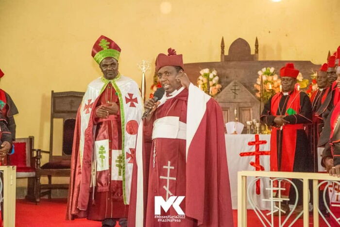 Imenti Central MP Moses Kirima and Archbishop Samson Muthuuri during a church service at Timau, Meru county