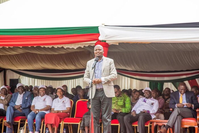 Moses Kuria addresses the public.