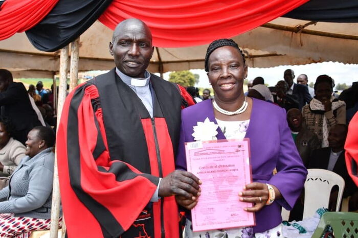 Murkomen's parents show off the certificate after the ordination
