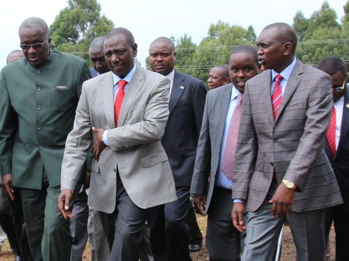 Ruto with Oscar Sudi. Ruto asked Mau residents to be calm and that the education sector won't be affected despite the eviction that is underway