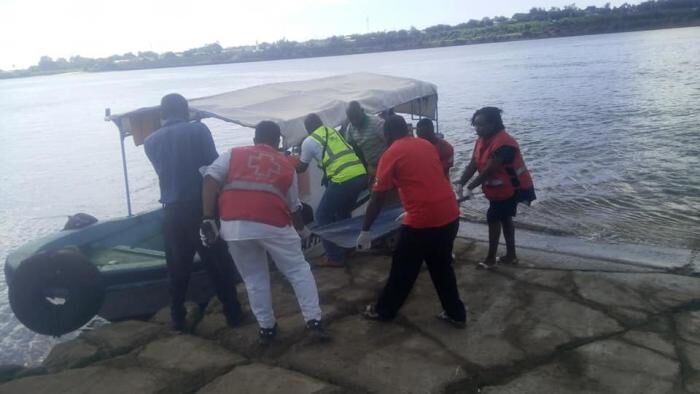 Rescuers retrieve the body of John Mutinda whose car plunged into the ocean on Saturday, December 7, 2019. He reportedly had an argument with his wife before leaving for the Likoni Channel