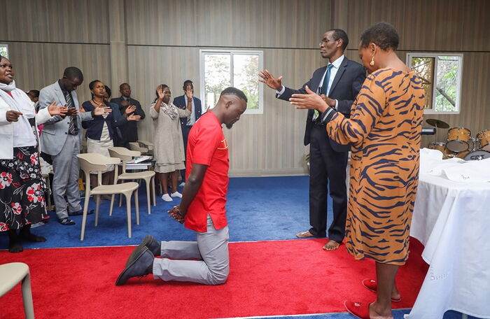 Jubilee Party candidate for Kibra by-election McDonald Mariga kneeling for prayers at the National Prayer Altar inside Deputy President William Ruto's official residence on Wednesday, October 30, 2019. 