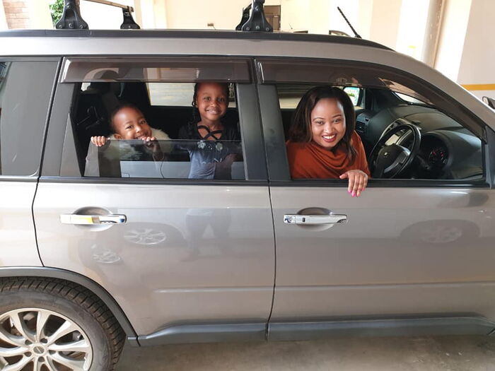 Bonnie Musambi's wife and their children take a ride in their new Nisaan X-trail.