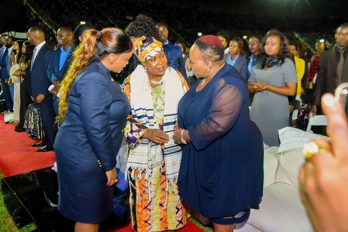 Rev. Lucy Natasha (Left) and Zimbabwe first lady Auxilia Mnangagwa (Centre) at Harare sports stadium on November 22