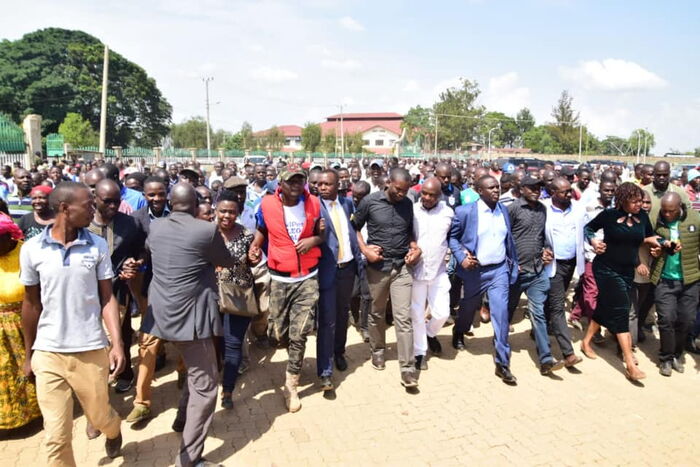 ODM Secretary-General Edwin Sifuna (in black) walks towards Bukhungu Stadium