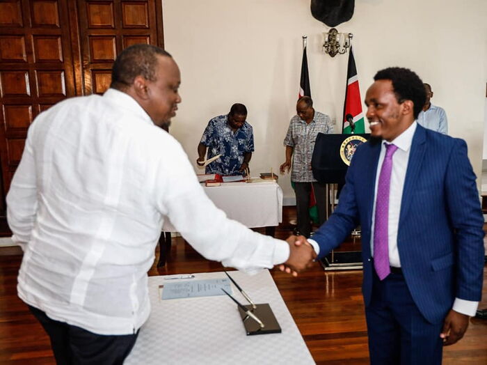 President Uhuru Kenyatta greets Zachary Kinuthia on Friday, January 17, 2020.