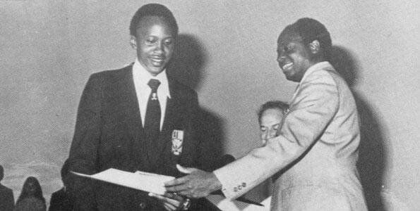 Young Uhuru Kenyatta receives a present from Mwai Kibaki in 1979