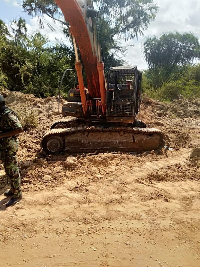 A stalled excavator that was set ablaze by suspected Al Shabab Militia on February 9.