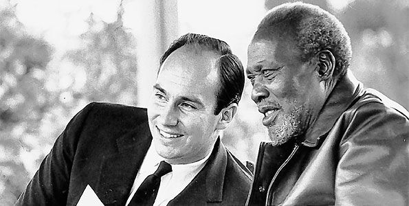 Mzee Jomo Kenyatta speaking with His Highness The Aga Khan. The latter was put between a rock and a hard stone when Kenyatta suggested his kin become chairman of Nation