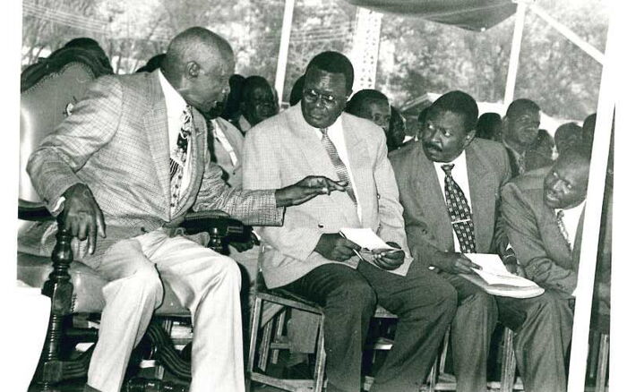 From left: Former President Moi, Chris Obure and Musalia Mudavadi at a past function