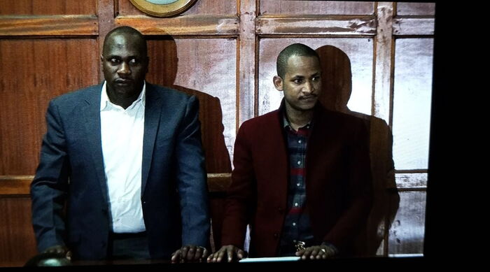 Embakasi East MP Babu Owino appearing in court alongside his bodyguard Fanuel Owino in January 2018