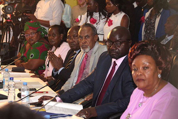 Members of the BBI committee listening in during a session of presentations