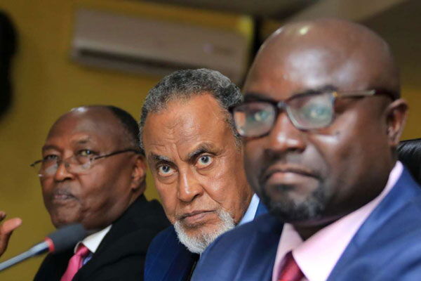 Building Bridges Initiative chairman Yusuf Haji (centre) and vice-chairman Adams Oloo (right) listen to submissions from members of the public at the Kenya School of Government in Nairobi on November 22, 2018.