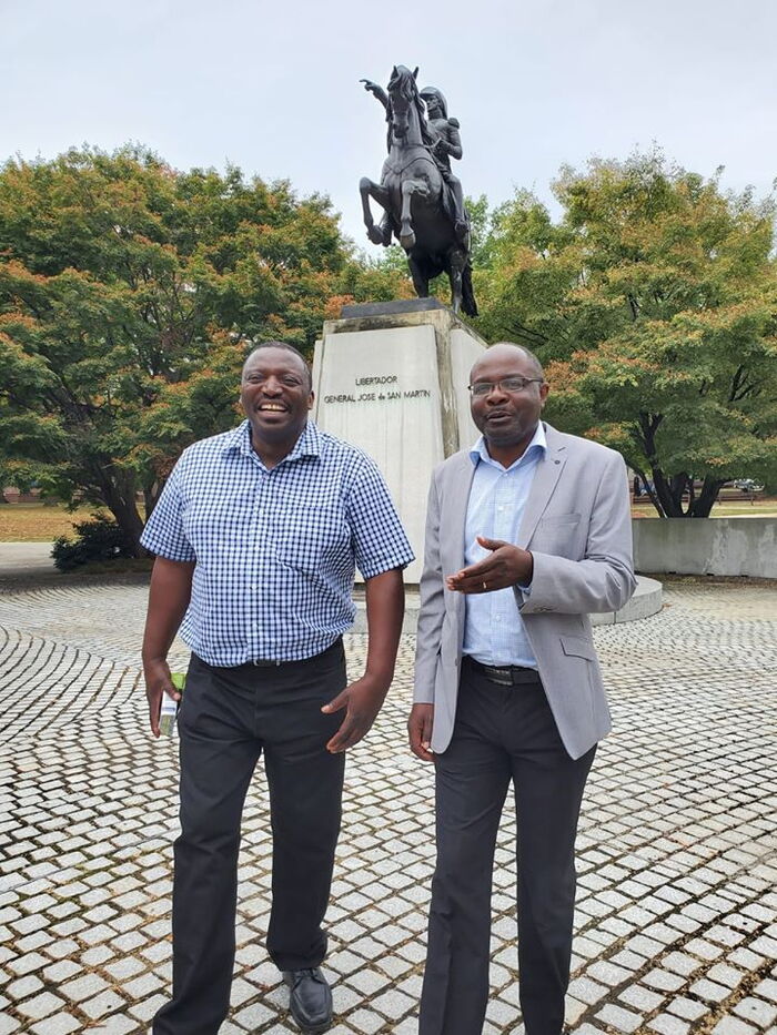 Alex Chamwada with a friend in New Jersey on October 7, 2019.