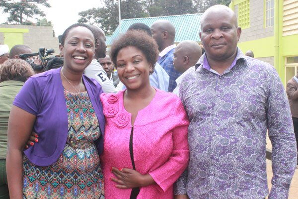 Murang'a County Woman Representative-elect Sabina Wanjiru Chege (left) a supporter, and her husband Maina Gathito after she was given her certificate at Murang’a County tallying centre on August 13, 2017.