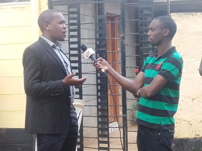 Peptang CEO Joseph Choge (left) is interviewed by a K24 reporter after addressing the 