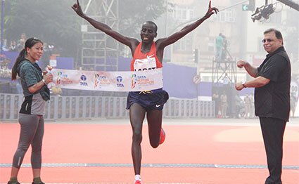 Image result for Cosmas Kiplimo Lagat has set a record at the 16th Mumbai Marathon in India