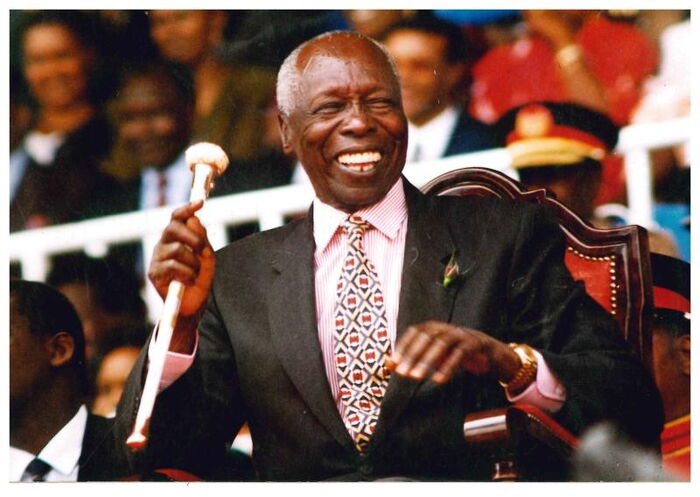 File image of former President Daniel Arap Moi laughing heartily at a past national event