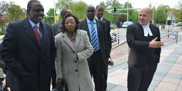 Deputy President William Ruto (left), his wife Rachel Ruto (centre) and lawyer Karim Khan (right) arrive at The International Criminal Court (ICC) for a status conference May 14, 2013.