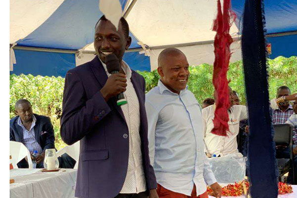 Deputy President William Ruto's son Nick and Jubilee Party youth leader Victor Ayugi preside over a fundraiser at Nyamasore Catholic Church in Rarieda, Siaya County, on October 6, 2019.