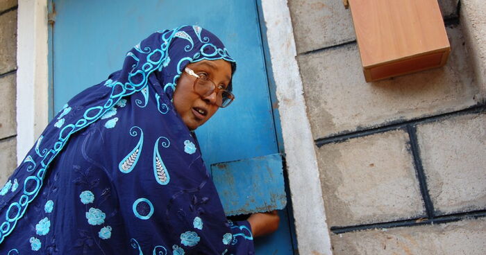  Ijara MP Sophia Abdinoor locks up the TSC offices in Garissa county on Tuesday, February 4