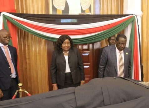 ODM leader Raila Odinga pays his last respects to former President Daniel Arap Moi at Parliament buildings on Monday, February 10