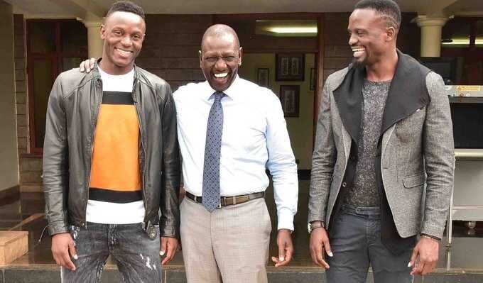 DP William Ruto with McDonald Mariga (r) and Victor Wanyama (l). IEBC Chairman Wafula Chebukati's order to an IEBC Returning Officer to clear Mariga divided IEBC