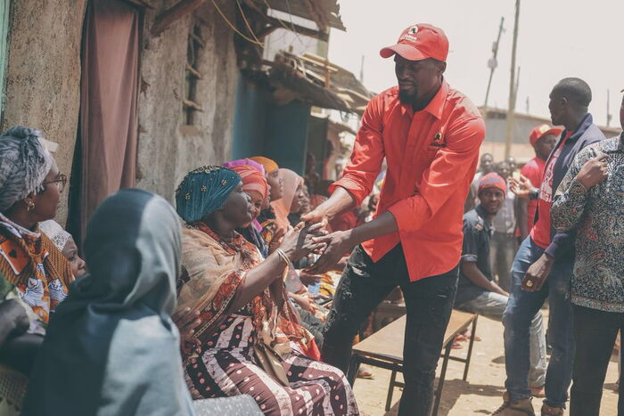 Kibra by-election aspirant McDonald Mariga engaging with residents while drumming up support for his bid
