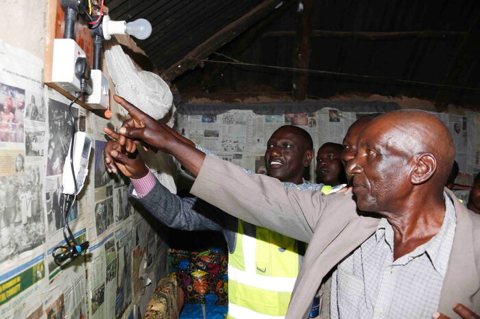 DP William Ruto switches on the lights in the home of Subano Arosi, 77,a widower and farmer in Tente, West Mugirango, phase two of the last mile project in Nyamira County on Saturday October 26.