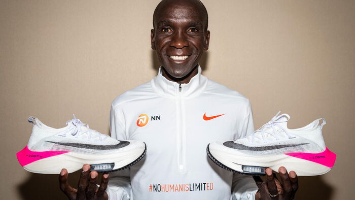 Eliud Kipchoge posing for a photo with his training kit before the historic INEOS marathon challenge. He urged Sports CS Amina Mohammed to look into the affairs of athletes who feel neglected by the government.