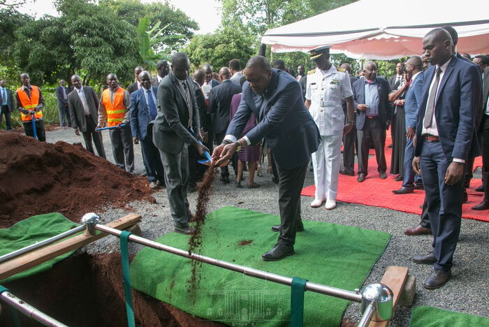 President Uhuru Kenyatta pays his last respects to former Cabinet Minister Charles Wanyoike Rubia at Karigu-ini Primary School grounds in Murang'a County on Monday, December 30