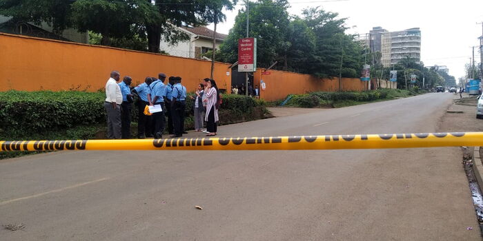 Police calm down occupants at Doctor's Park in Nairobi after a bomb scare on Thursday, January 30