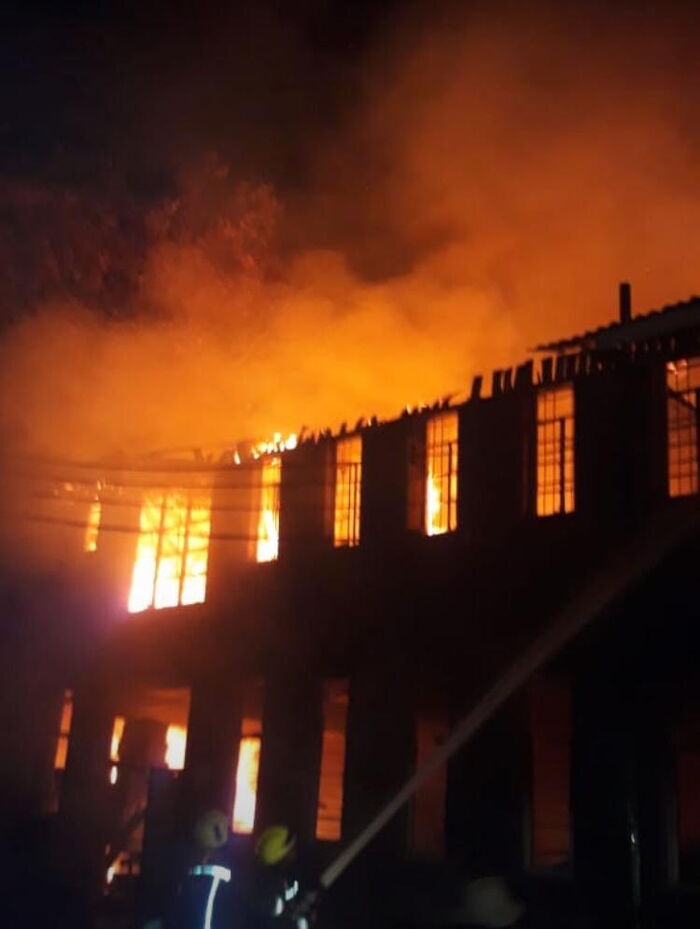 A fire destroys buildings at Starehe Boys Centre in Nairobi on February 15, 2020.