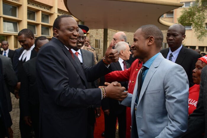 President Uhuru Kenyatta and Babu Owino shake hands on May 2, 2018. Babu asked the President to write off student loans owed to HELB.