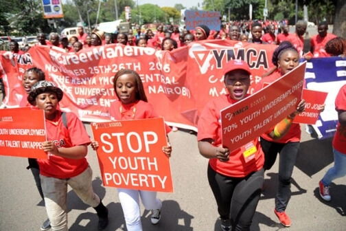Youths in Nairobi take to the streets to protest unemployment on November 25, 2016.