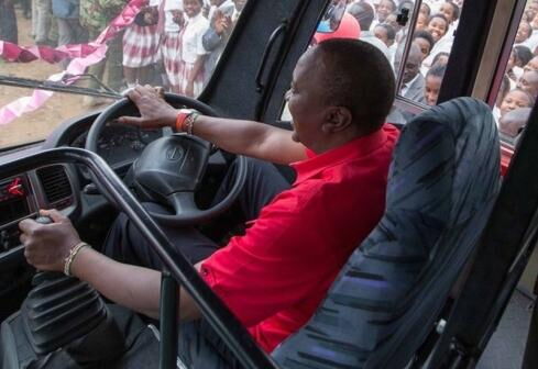President Uhuru Kenyatta driving the Maasai Girls High School bus on 12/07/17