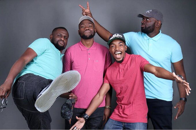 From left - Calvin, Neville, DJ Andy Young and G-Money pose for a photo on August 3, 2018.
